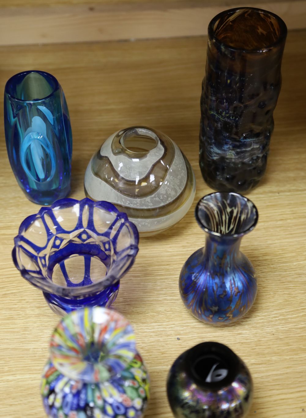 A millefiori weight, a scent bottle with stopper, a jar and six other coloured glass items